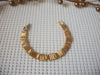 Vintage Bracelet. 7 1/4" Signed MONET Gold Tone Panel Links 52017