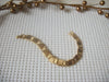 Vintage Bracelet. 7 1/4" Signed MONET Gold Tone Panel Links 52017