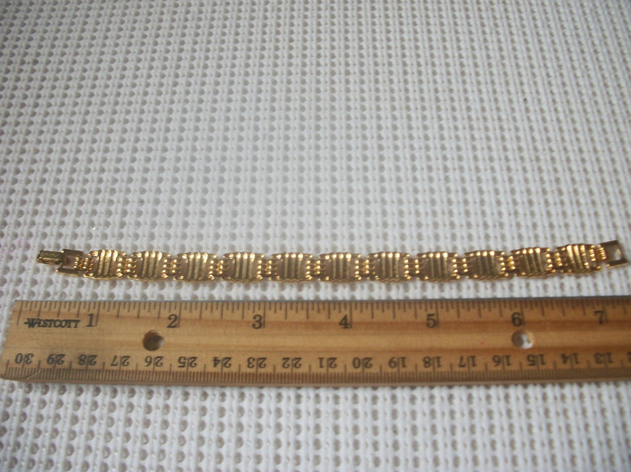 Vintage Bracelet. 7 1/4" Signed MONET Gold Tone Panel Links 52017