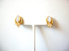 Small AVON Opaque Clear Rhinestone Gold Toned Clip On Earrings 92216