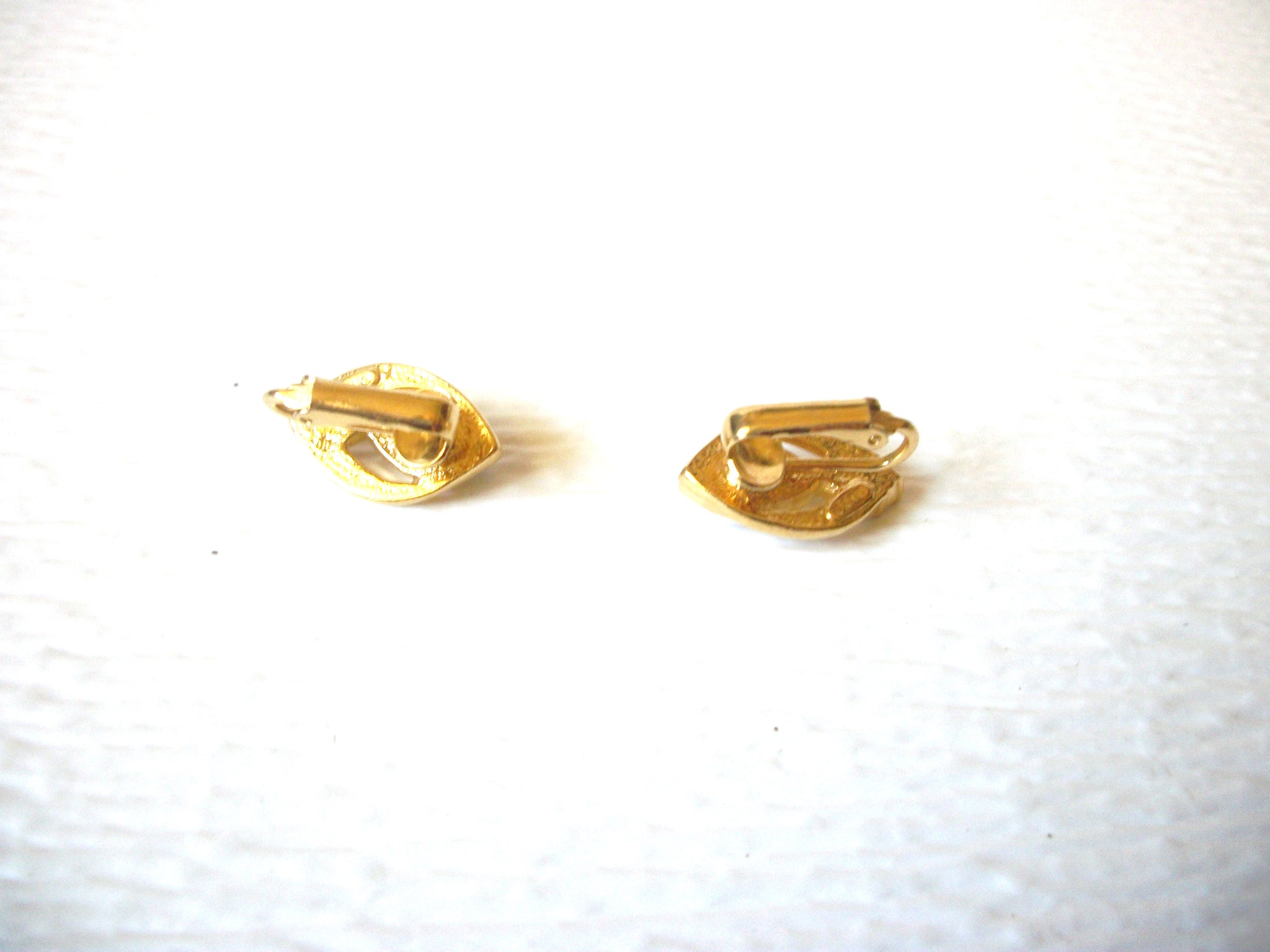 Small AVON Opaque Clear Rhinestone Gold Toned Clip On Earrings 92216