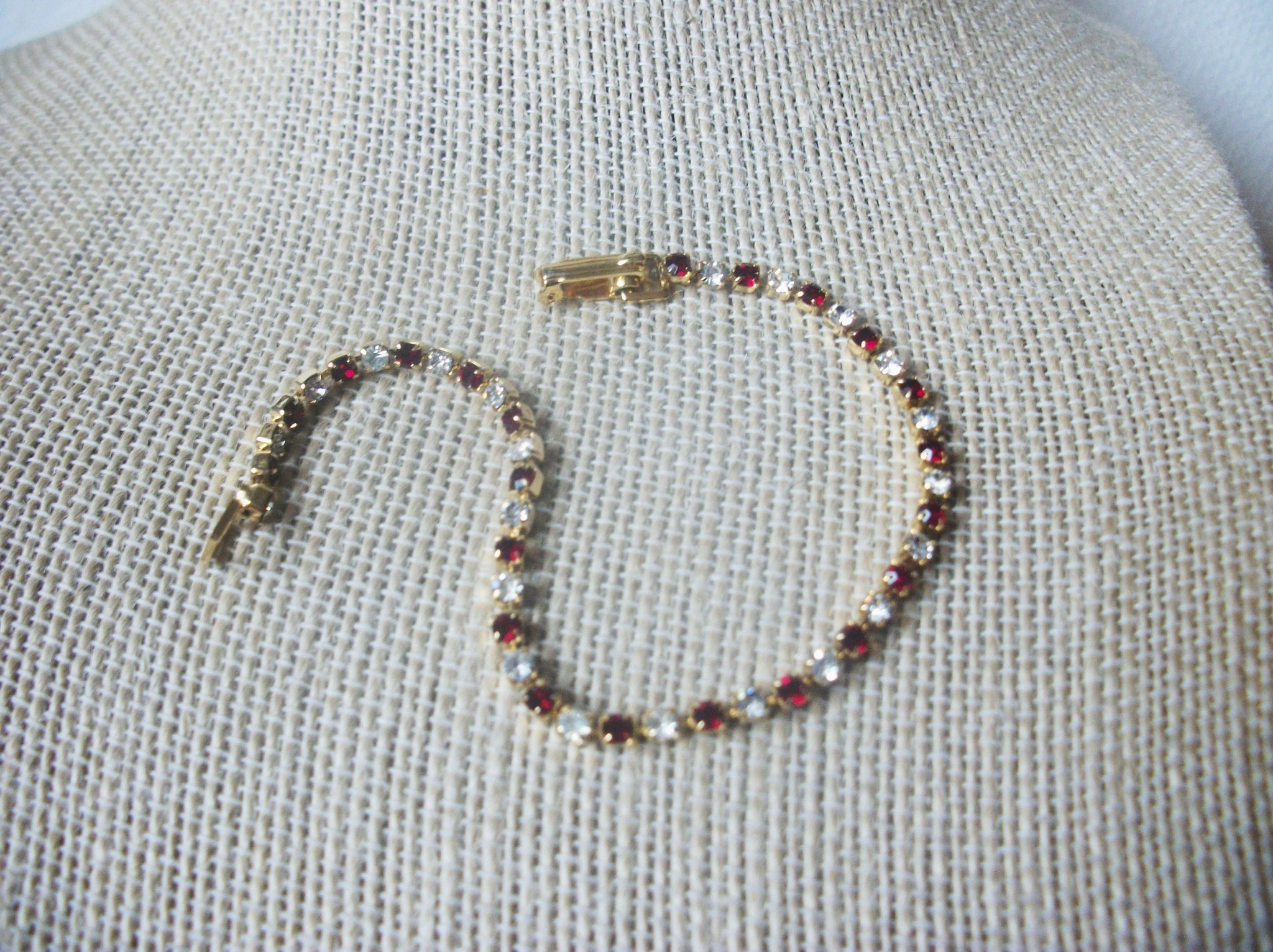 Red Ruby Clear Crystals, 7" Long Gold Tone Tennis Bracelet, Vintage 022121